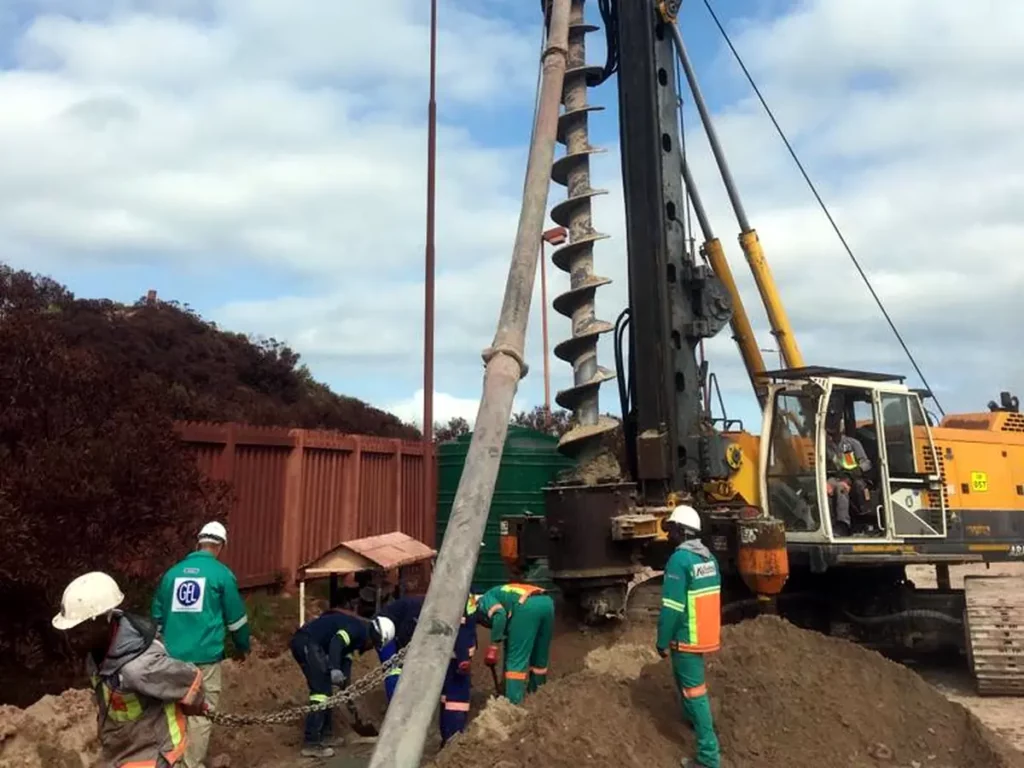 P002 saldanha substation n auger drilling rig closeup crew