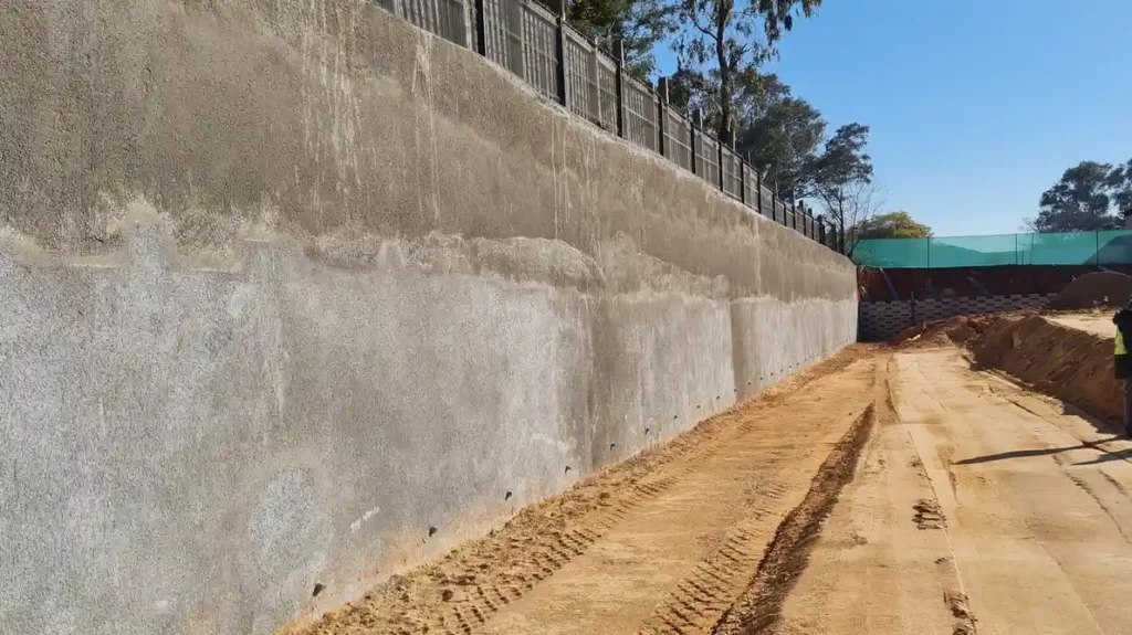 P003 meadowview lateral support 10 access road along wall angled view